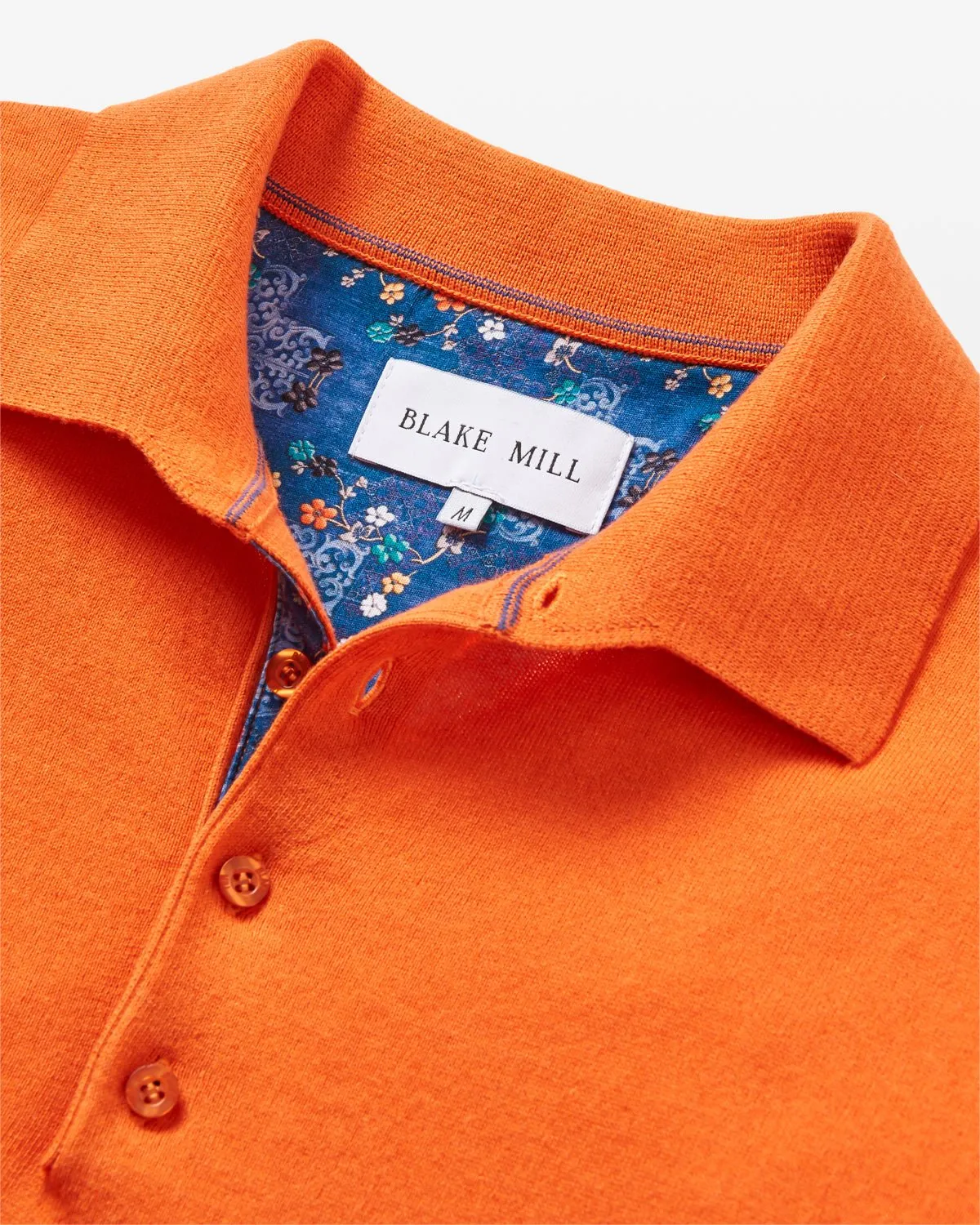 Orange Knit Polo with Flower Accents