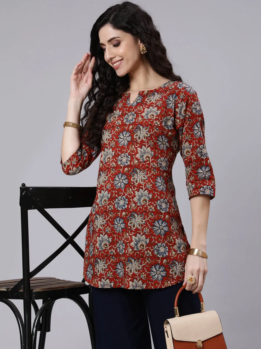 Women Rust Floral Printed Straight Tunic With Three Quarter Sleeves